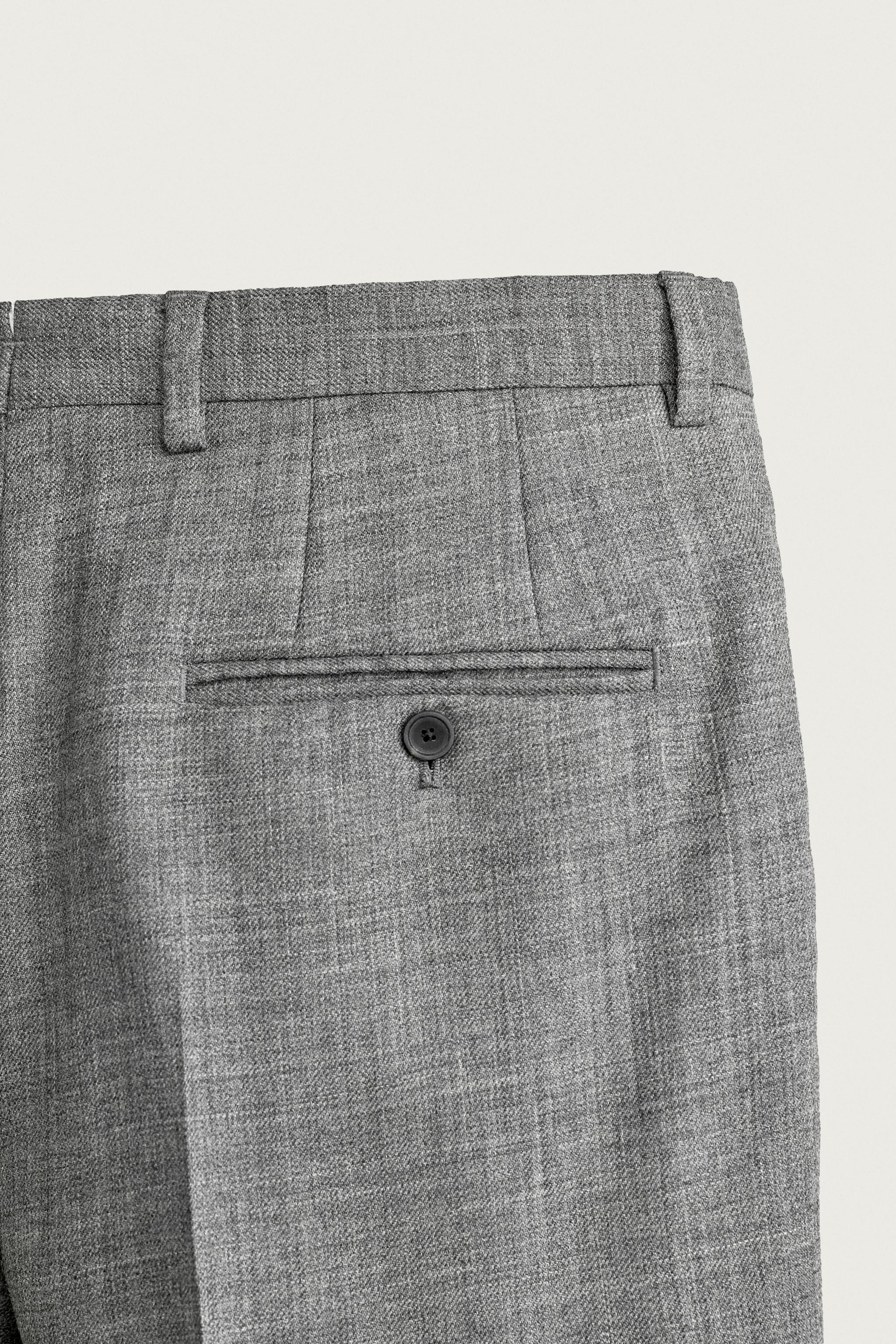 100% WOOL PLEATED PANTS